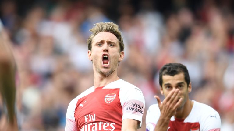 Nacho Monreal celebrates his equaliser