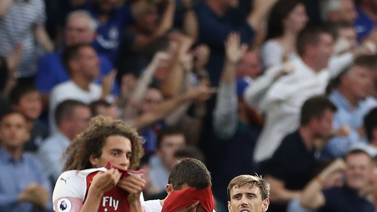 Matteo Guendouzi and Nacho Monreal react during Arsenal's defeat to Chelsea