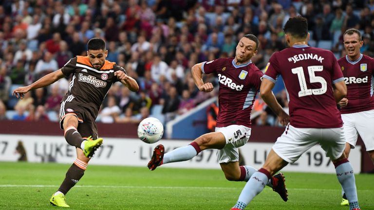 Neal Maupay of Brentford scores his team's first goal during the Sky Bet Championship match between Aston Villa and Brentford at Villa Park on August 22, 2018 in Birmingham, England