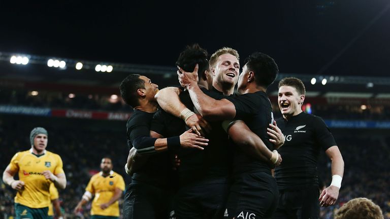 New Zealand&#39;s players celebrate scoring a try during the Bledisloe Cup Rugby Championship match against Australia Wallabies at Westpac Stadium on August 27, 2016 in Wellington, New Zealand.