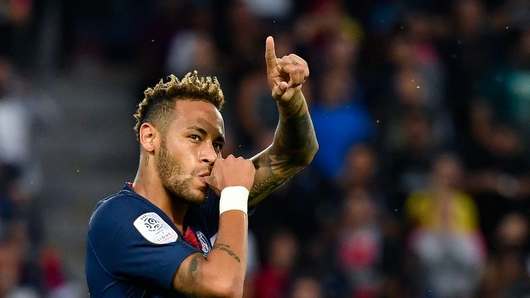 Neymar celebrates after scoring during the League 1 match between Paris Saint-Germain and Caen