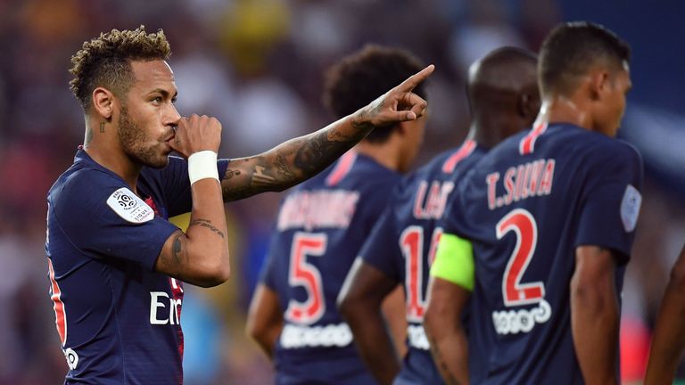 Neymar celebrates after scoring during the League 1 match between Paris Saint-Germain and Caen