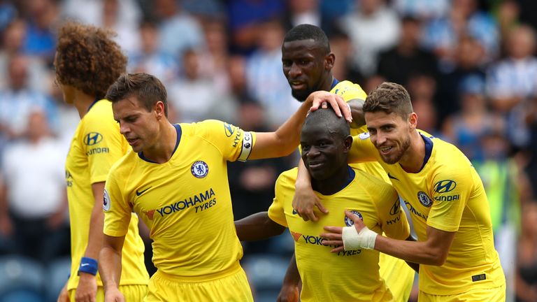 N'Golo Kante is congratulated by teammates after scoring Chelsea's first goal