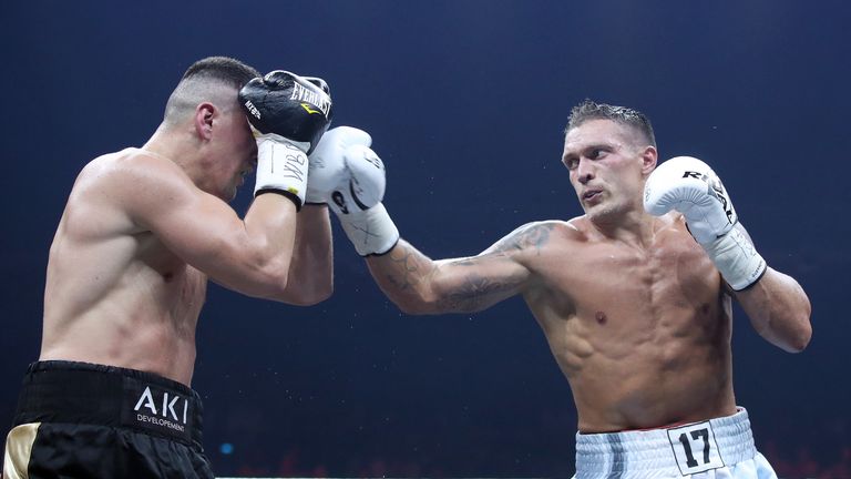 BERLIN, GERMANY - SEPTEMBER 09: Marco Huck (L) of Germany and Aleksandr Usyk (R) of Ukraine exchange punches during the WBO Cruiserweight World Boxing Super Series fight at Max Schmeling Halle on September 9, 2017 in Berlin, Germany. (Photo by Ronny Hartmann/Bongarts/Getty Images)   *** Local caption *** Marco Huck; Aleksandr Usyk