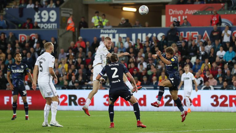 Swansea City's Oli McBurnie scores their second goal during the Sky Bet Championship match at the Liberty Stadium, Swansea. PRESS ASSOCIATION Photo. Picture date: Tuesday August 21, 2018. See PA story SOCCER Swansea. Photo credit should read: David Davies/PA Wire. RESTRICTIONS: EDITORIAL USE ONLY No use with unauthorised audio, video, data, fixture lists, club/league logos or "live" services. Online in-match use limited to 120 images, no video emulation. No use in betting, games or single club/league/player publications.