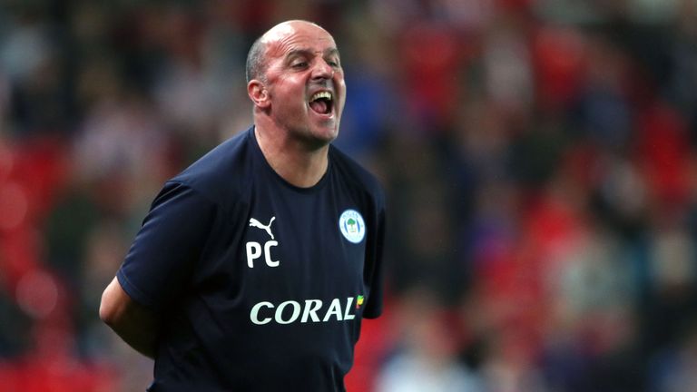 Wigan Athletic manager Paul Cook on the touchline at the bet365 Stadium