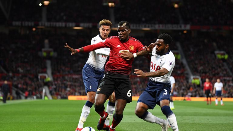 Paul Pogba's route to goal is closed down by Danny Rose and Dele Alli