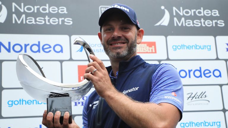 Paul Waring proudly displays the trophy after winning the Nordea Masters at Hills Golf Club on August 19, 2018 in Gothenburg, Sweden.