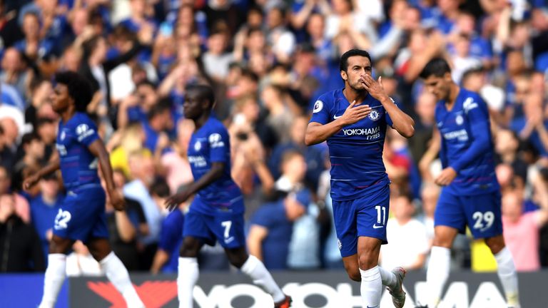 Pedro of Chelsea celebrates after scoring his team's first goal during the Premier League match between Chelsea FC and Arsenal FC at Stamford Bridge on August 18, 2018 in London, United Kingdom