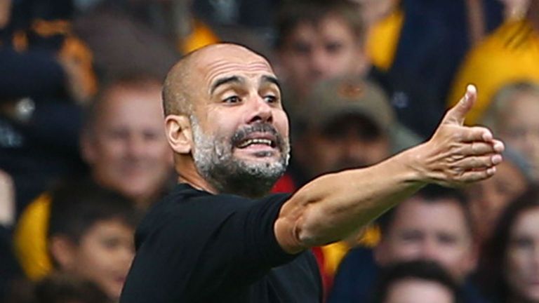 Manchester City's Spanish manager Pep Guardiola gestures from the touchline during the English Premier League football match between Wolverhampton Wanderers and Manchester City at the Molineux stadium in Wolverhampton, central England on August 25, 2018