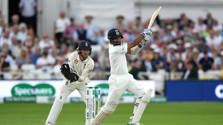 Cheteshwar Pujara hit his first half-century of the series but was dropped early on day three
