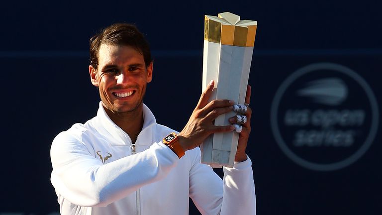 Rafael Nadal of Spain with the champions trophy following his win in the final match against Stefanos Tsitsipas of Greece on Day 7 of the Rogers Cup at Aviva Centre on August 12, 2018 in Toronto, Canada. 