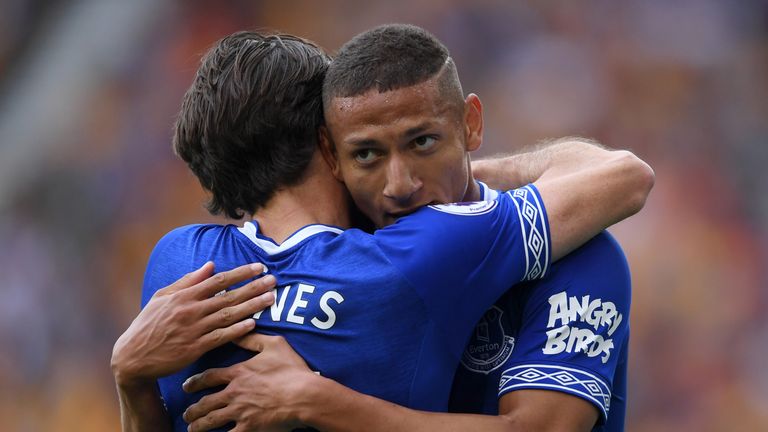 Richarlison celebrates  his goal with teammate Leighton Baines