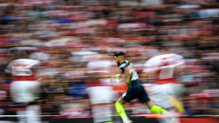 Riyad Mahrez runs at the Arsenal defence during the 2-0 win at the Emirates Stadium