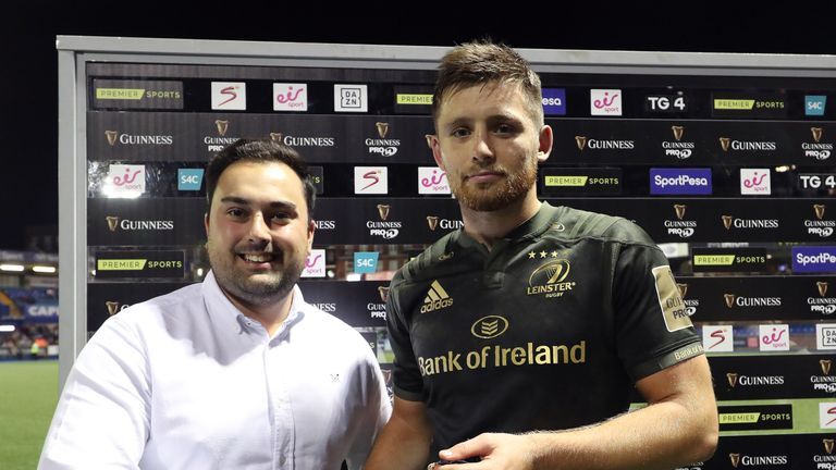 Guinness PRO14, BT Sport Cardiff Arms Park, Wales 31/8/2018.Cardiff Blues vs Leinster.Leinster's Ross Byrne is presented with the Guinness PRO14 Man of the Match award by Sam Harries.Mandatory Credit ..INPHO/Billy Stickland