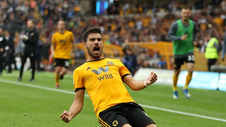 Ruben Neves celebrates after scoring Wolves' equaliser