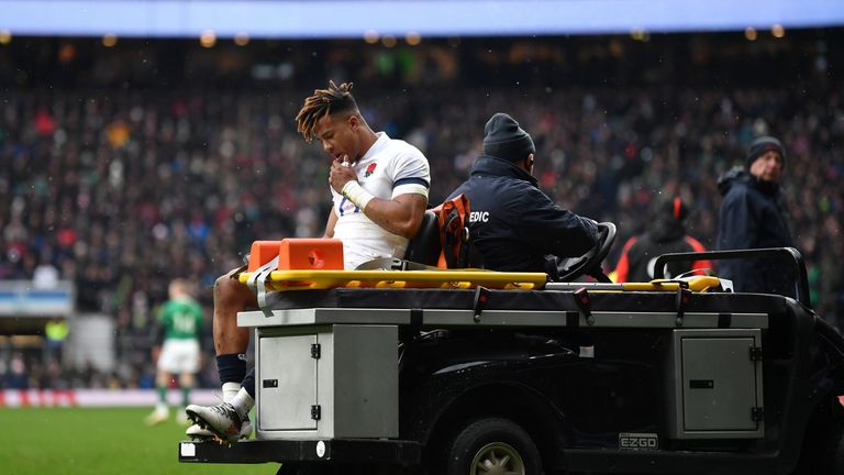 Anthony Watson leaves the field injured during England's Six Nations loss to Ireland in March 2018