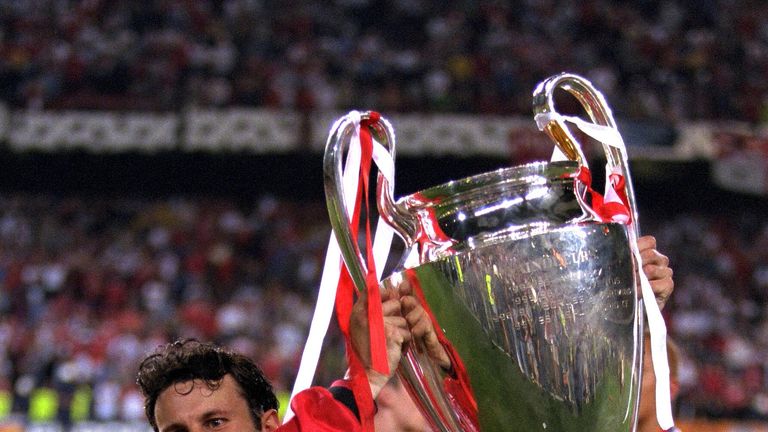 Ryan Giggs with the Champions League trophy for Manchester United in 1999