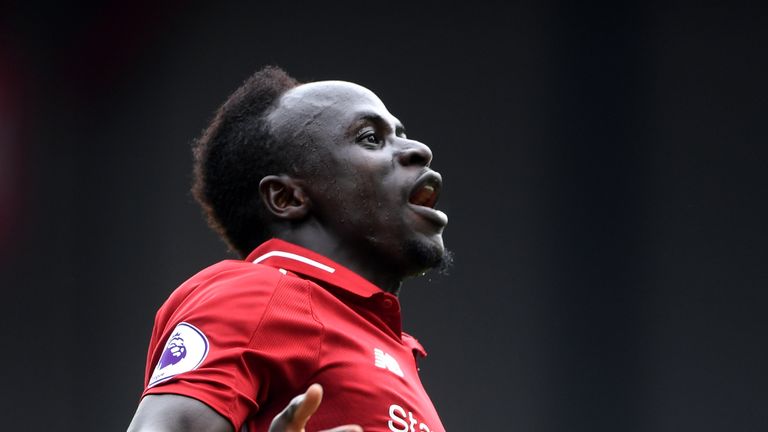 Sadio Mane celebrates after scoring Liverpool's third goal