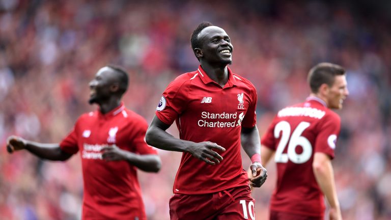 Sadio Mane celebrates scoring his Liverpool's third goal
