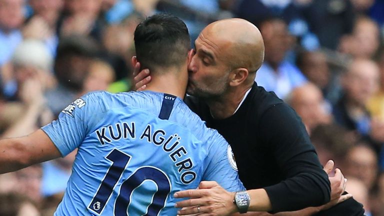 Pep Guardiola kisses Sergio Aguero after his hat-trick against Huddersfield