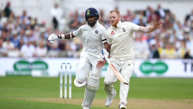 Shikhar Dhawan and Ben Stokes during the Specsavers 3rd Test match between England and India at Trent Bridge on August 18, 2018 in Nottingham, England.