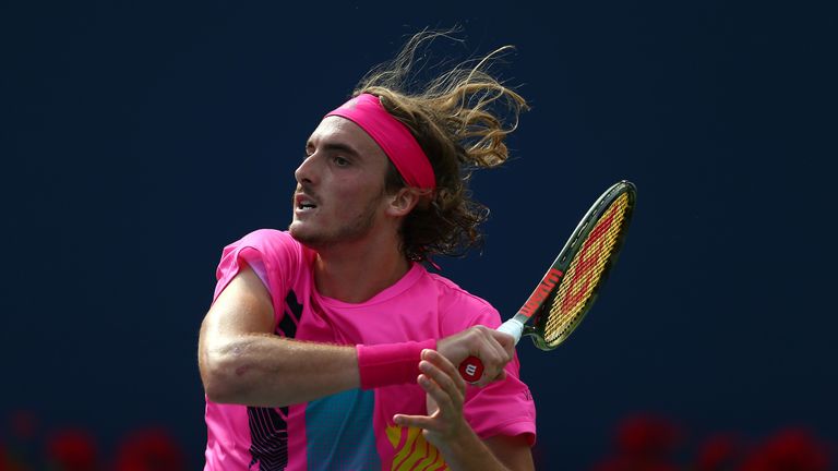 Stefanos Tsitsipas of Greece plays a shot against Novak Djokovic of Serbia during a 3rd round match on Day 4 of the Rogers Cup at Aviva Centre on August 9, 2018 in Toronto, Canada.