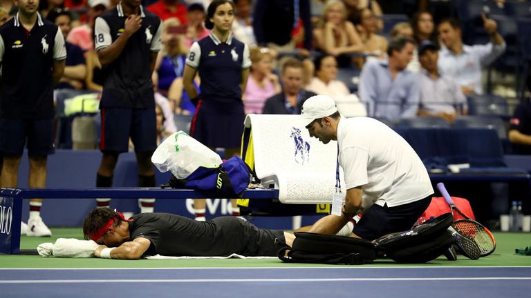 David Ferrer receives treatment during match against Rafael Nadal  on Day One of the 2018 US Open
