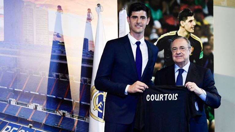 New signing Thibaut Courtois poses with Real Madrid president Florentino Perez during his presentation