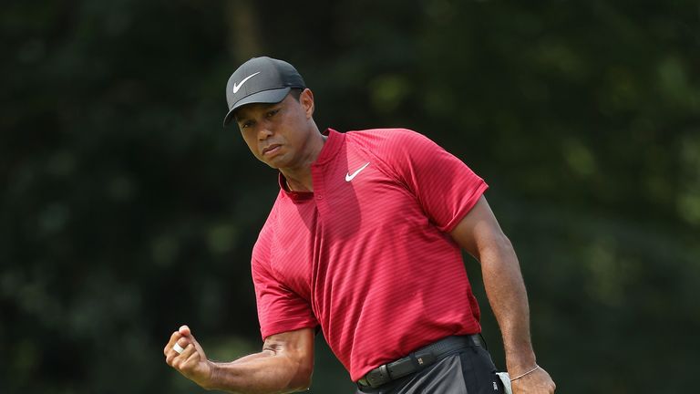 ST LOUIS, MO - AUGUST 12:  Tiger Woods of the United States reacts after making a putt for birdie on the ninth green during the final round of the 2018 PGA Championship at Bellerive Country Club on August 12, 2018 in St Louis, Missouri.  (Photo by Richard Heathcote/Getty Images)