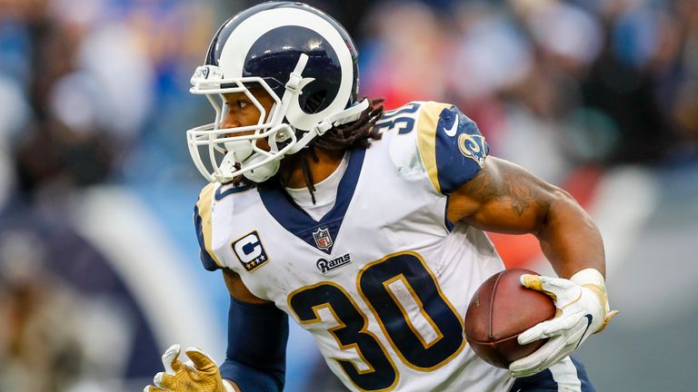 NASHVILLE, TN - DECEMBER 24: Running Back Todd Gurley II  #30 of the Los Angeles Rams  carries the ball against the Tennessee Titians at Nissan Stadium on December 24, 2017 in Nashville, Tennessee. (Photo by Wesley Hitt/Getty Images)  *** Local Caption *** Todd Gurley II;