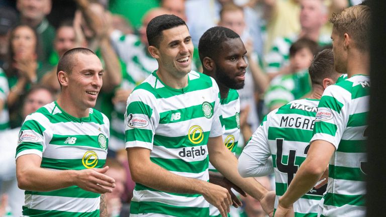 Tom Rogic (second left) celebrates scoring Celtic's opening goal 