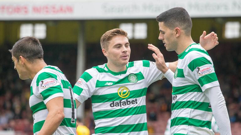 Celtic's Tom Rogic (right) celebrates scoring his side's third goal of the game against Partick