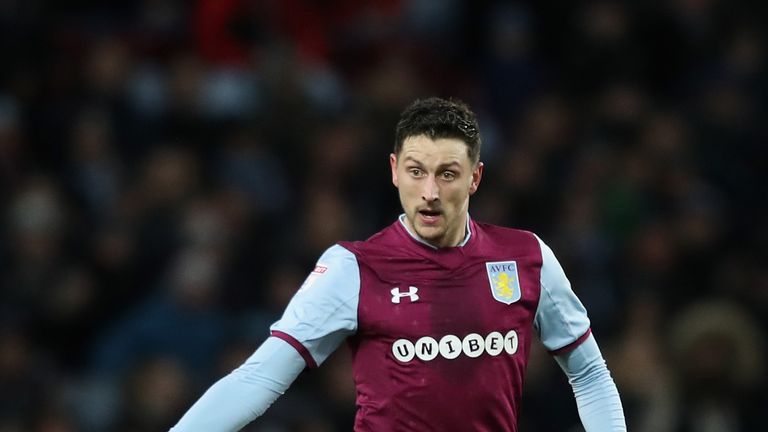 Tommy Elphick of Aston Villa runs with the ball during the Sky Bet Championship match between Aston Villa and Bristol City at Villa Park on January 1, 2018 in Birmingham, England.