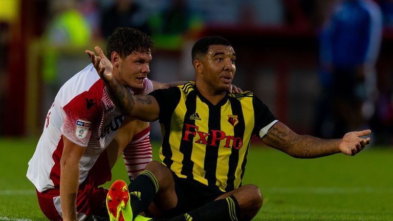 Troy Deeney of Watford and Luther Wildin of Stevenage