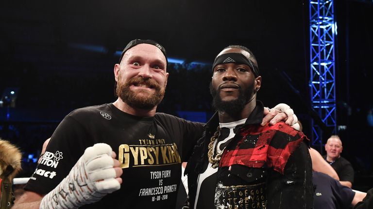 BELFAST, NORTHERN IRELAND - AUGUST 18: Tyson Fury poses with rival boxer Deontay Wilder after defeating Francesco Pianeta in a heavyweight contest at Windsor Park on August 18, 2018 in Belfast, Northern Ireland. (Photo by Charles McQuillan/Getty Images)