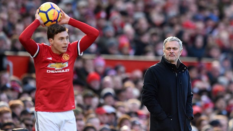 Manchester United&#39;s Portuguese manager Jose Mourinho watches as Manchester United&#39;s Swedish defender Victor Lindelof takes a throw-in during the English Premier League football match between Manchester United and Chelsea at Old Trafford in Manchester, north west England, on February 25, 2018