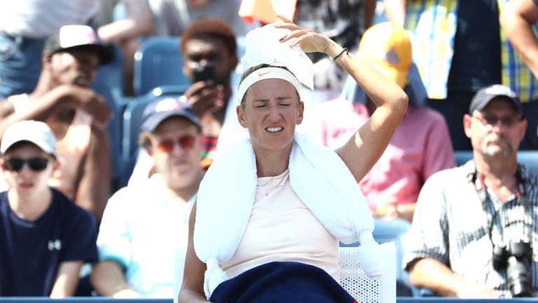 Searing heat again was evident in New York as Viktoria Azarenka moved into the third round