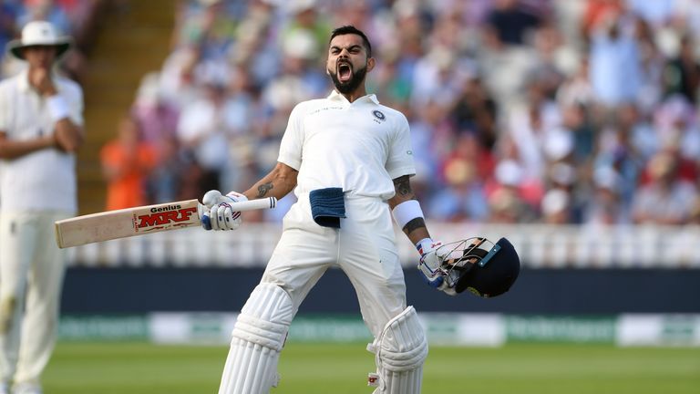 Virat Kohli celebrates his century for India on day two of the first Test against England