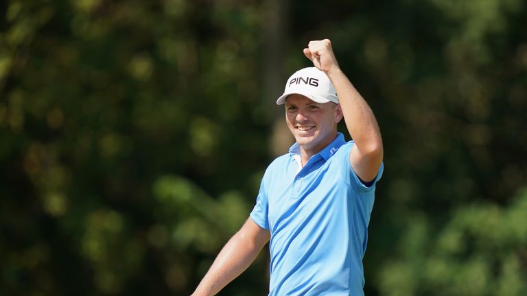 Matt Wallace celebrates his ace at the 16th