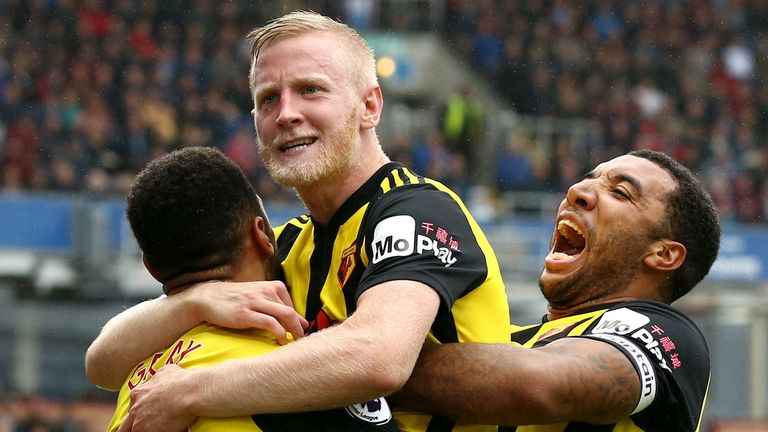 Will Hughes of Watford celebrates with teammates after scoring his team's third goal during the Premier League match between Burnley FC and Watford FC at Turf Moor on August 19,
