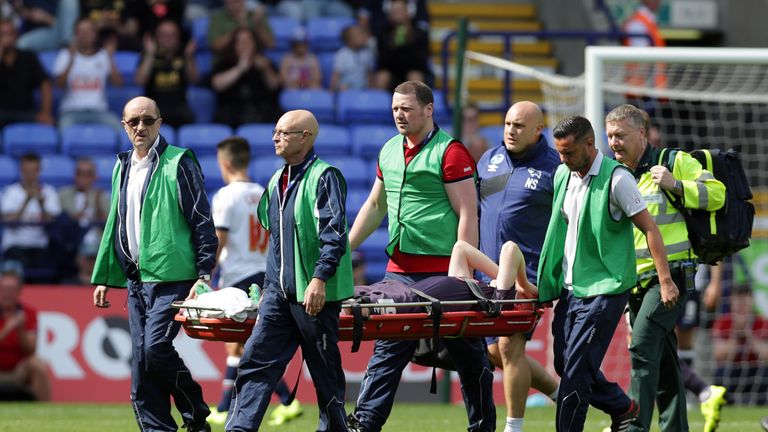 Will Hughes of Derby County is stretchered off the field after receiving an injury during the Sky Bet Championship match between Bolton Wanderers and Derby County at the Macron Stadium on August 8, 2015 in Bolton, England.