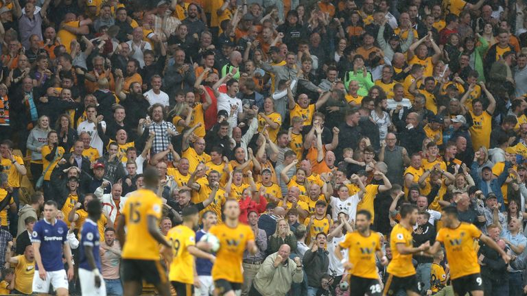 Wolves fans celebrate during the Premier League match between Wolverhampton Wanderers and Everton FC at Molineux on August 11, 2018 in Wolverhampton, United Kingdom.