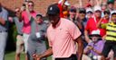 Woods shares lead, Rose one back