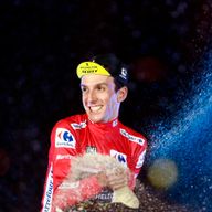 Simon Yates celebrates after winning the Vuelta a Espana