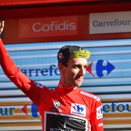 Simon Yates kept hold of his Vuelta a Espana lead after stage 18