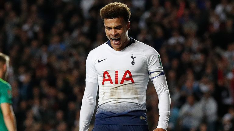 Dele Alli celebrates scoring against his former team