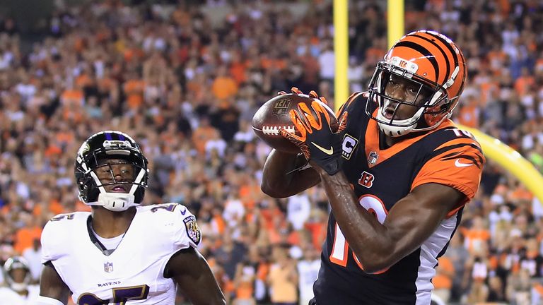CINCINNATI, OH - SEPTEMBER 13:  A.J. Green #18 of the Cincinnati Bengals scores a touchdown against Tavon Young #25 of the Baltimore Ravens during the first quarter at Paul Brown Stadium on September 13, 2018 in Cincinnati, Ohio.  (Photo by Andy Lyons/Getty Images)