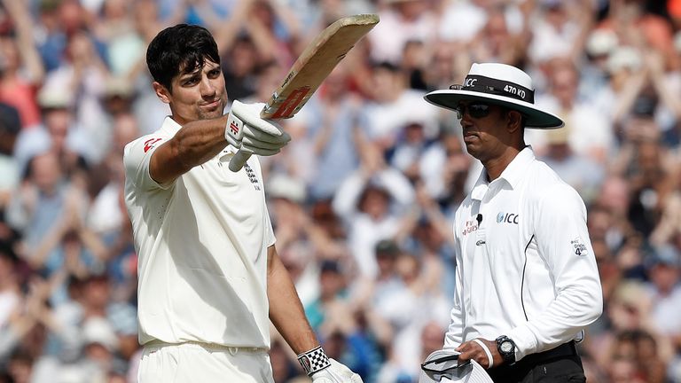 England's Alastair Cook (L) celebrates his century during play on the fourth day of the fifth Test cricket match between England and India at The Oval in London on September 10, 2018