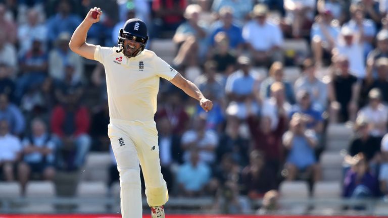 Cook celebrates taking the catch to dismiss Virat Kohli in the fourth Test at Southampton